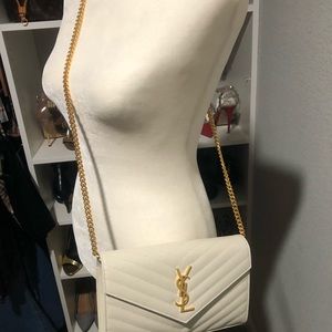 Latest style YSL envelope cross body.